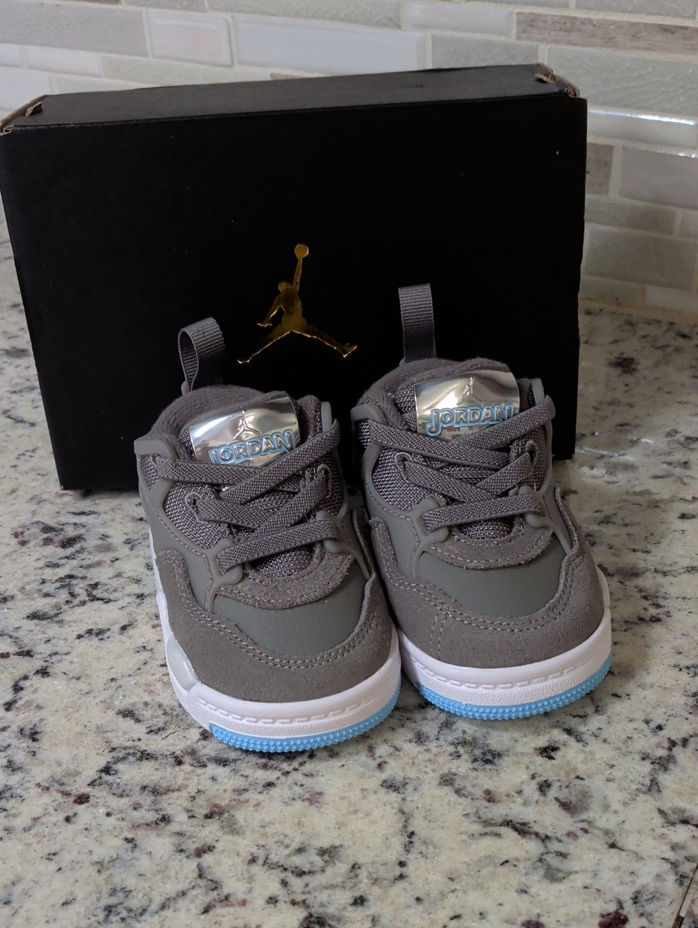 Jordan Toddler Gray Sneakers with Light Blue Outsoles